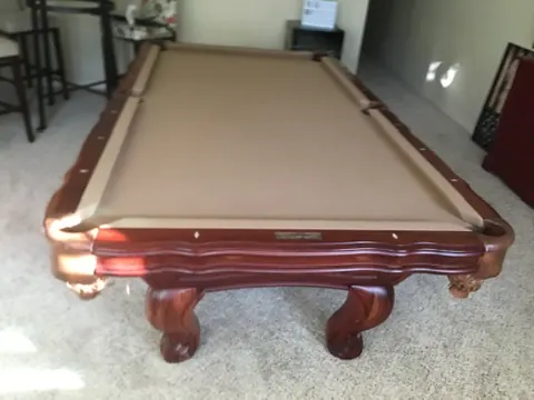 pool table leveling - table broken down and wrapped for transport
