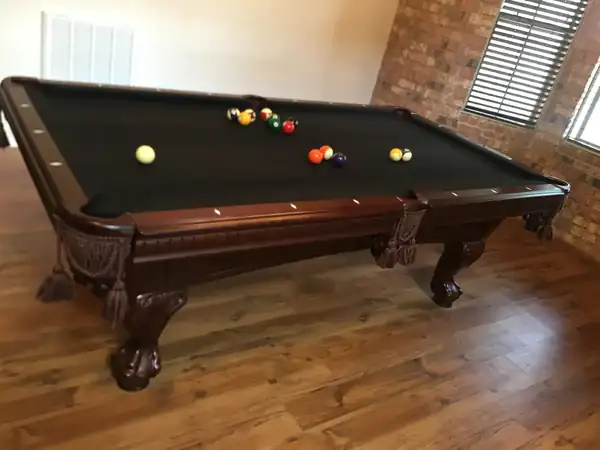 pool table delivery - rails and frame during refelt service